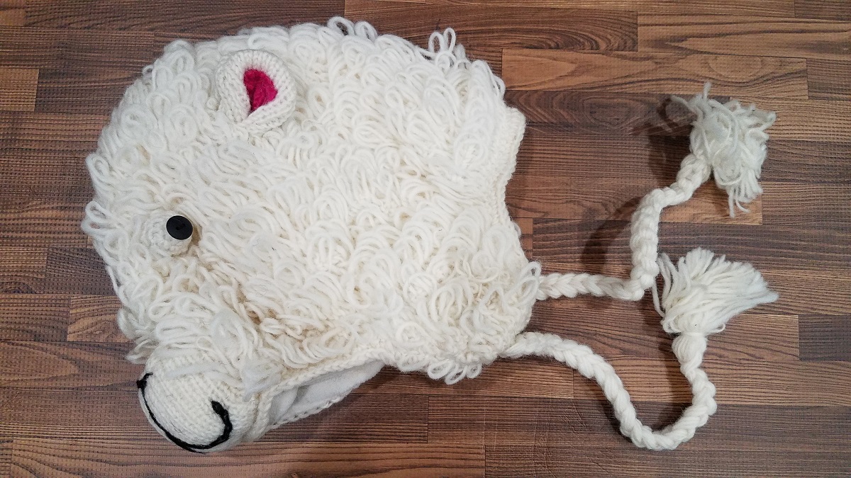 Woolen hat with fleece lined with ear flaps